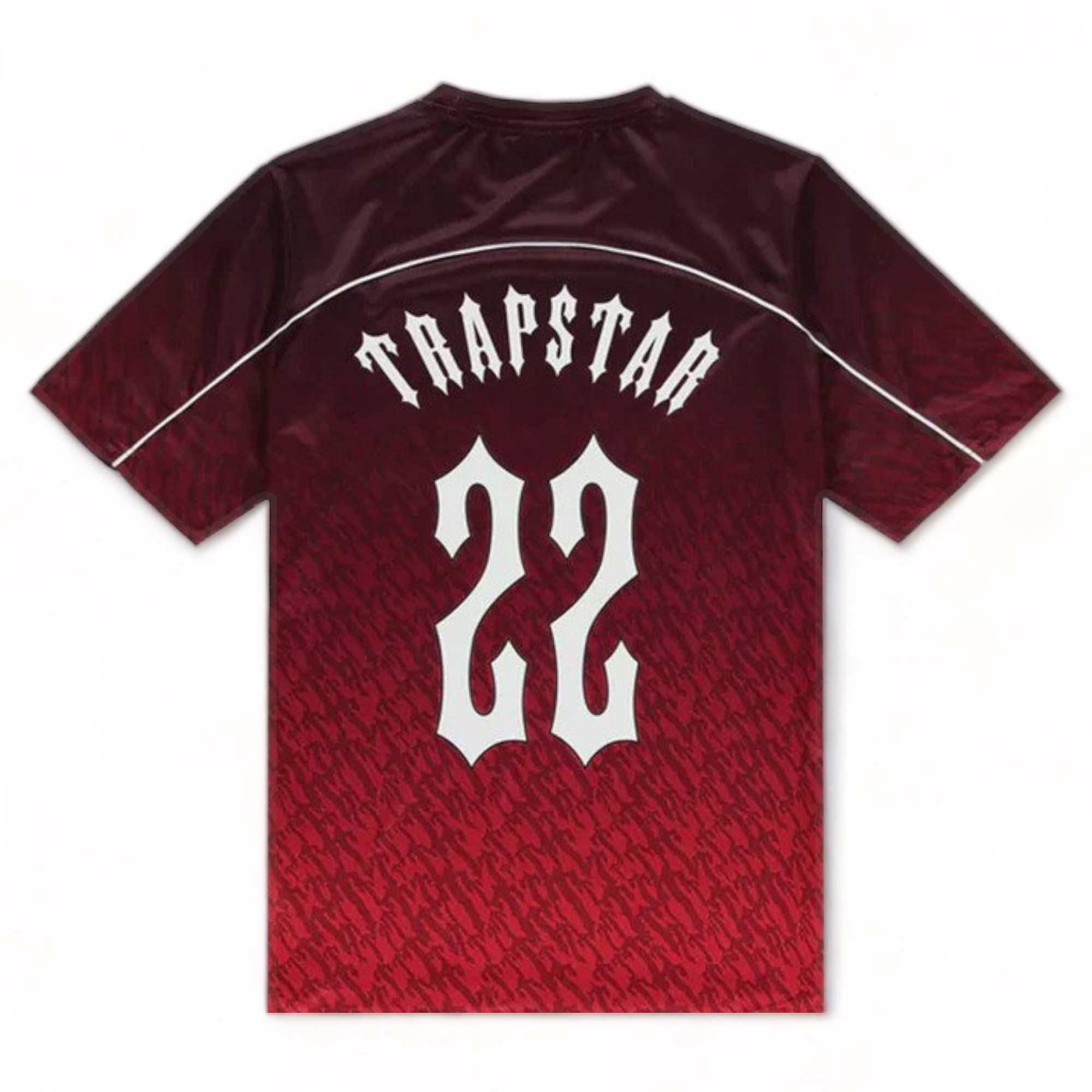 Red gradient Trapstar monogram jersey t-shirt featuring bold logo design and modern style.