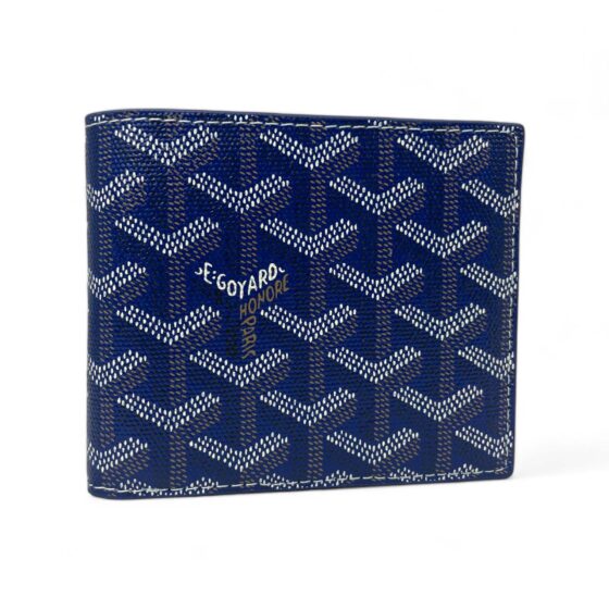 Blue Goyard wallet by Central ae featuring a sleek design and signature pattern, displayed on a neutral background.