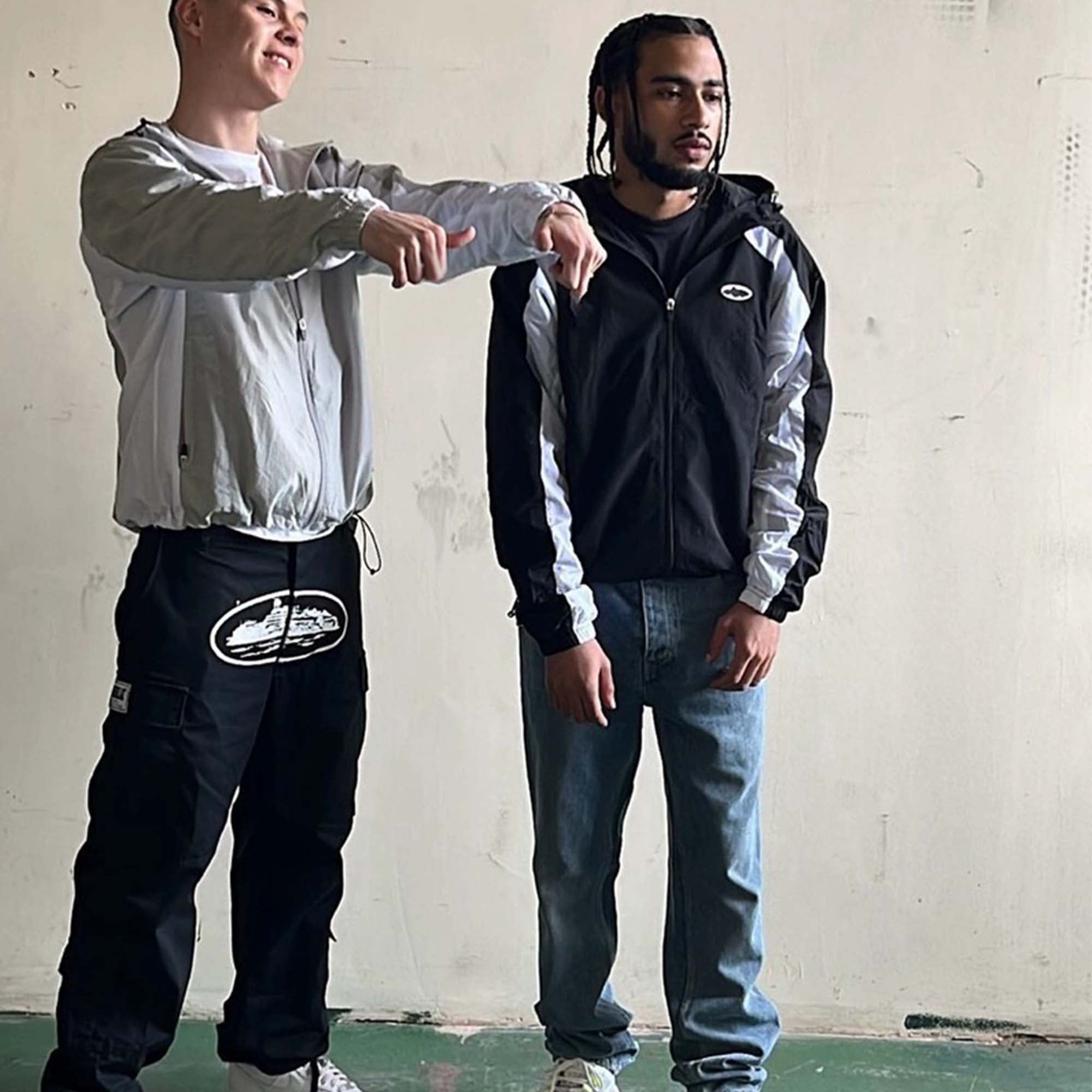 Black Corteiz hoodie jacket from Central, featuring a stylish design and comfortable fit, displayed against a neutral background.