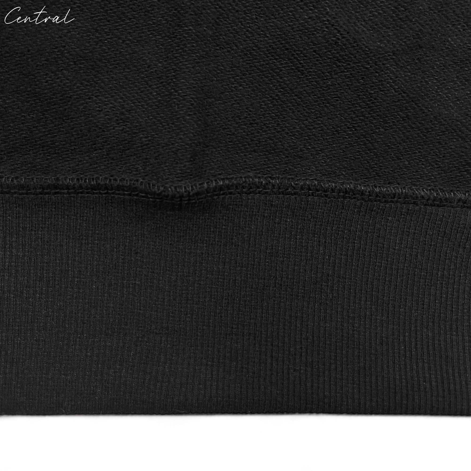 Black READYMADE x DENIM TEARS hoodie featuring a unique design by central, displayed on a neutral background.