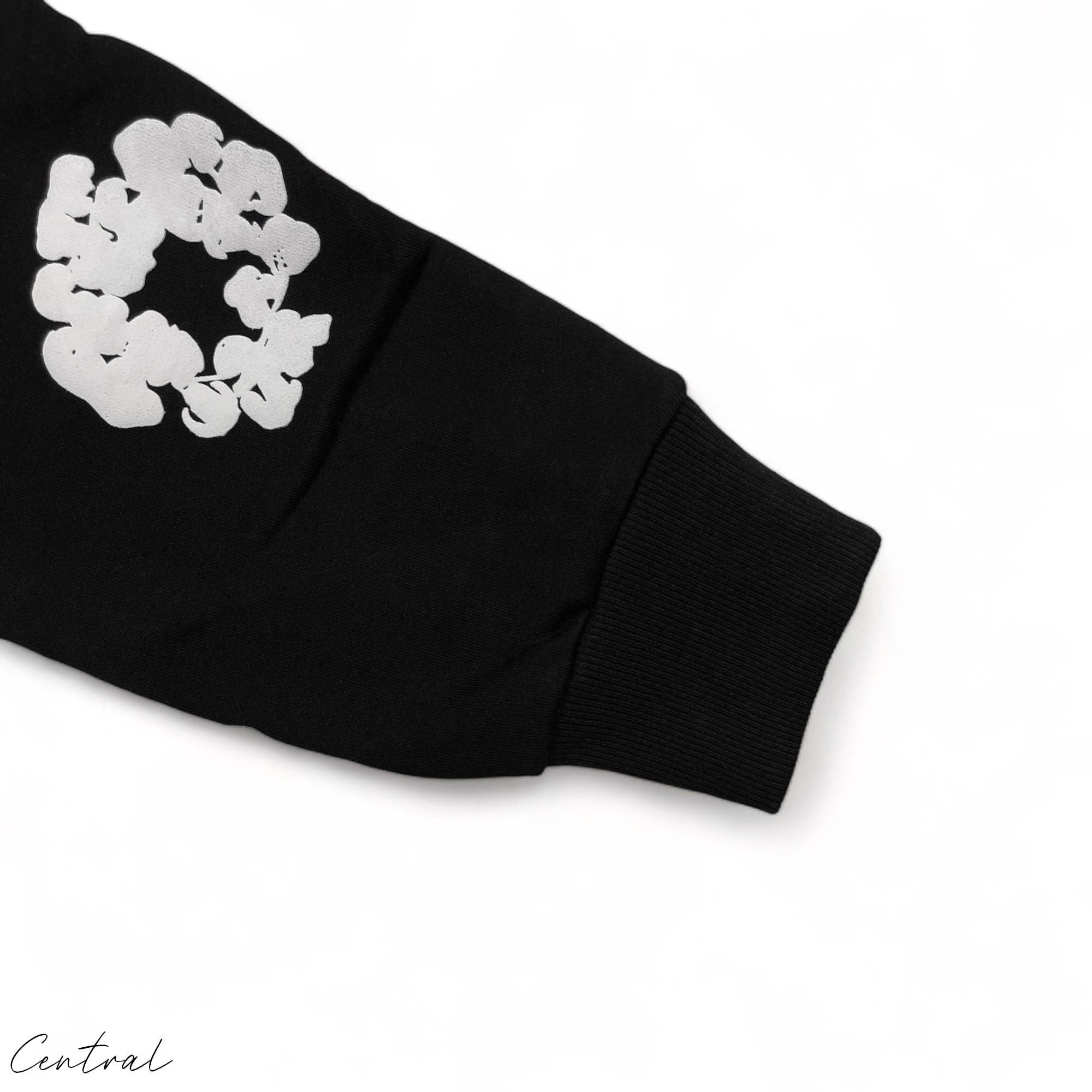 Black READYMADE x DENIM TEARS hoodie featuring a relaxed fit and unique graphic design by Central.