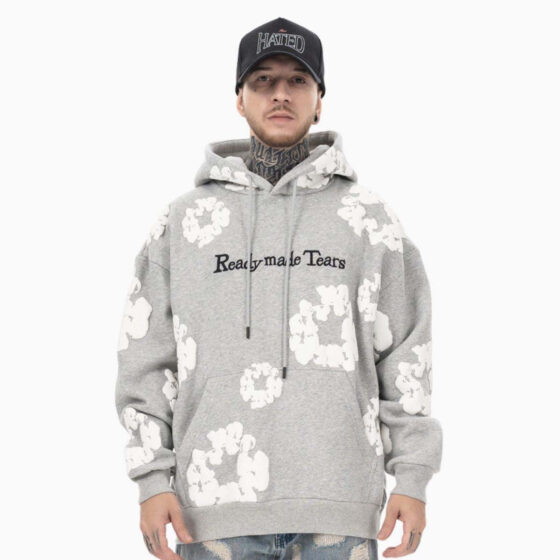 Gray READYMADE x DENIM TEARS hoodie featuring a relaxed fit and unique design details by central.
