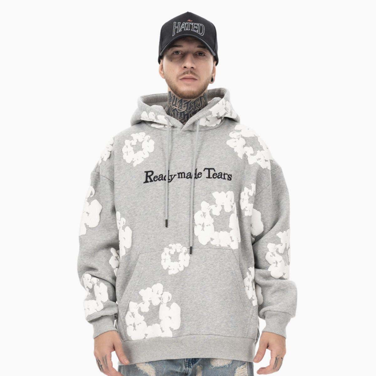 Gray READYMADE x DENIM TEARS hoodie featuring a relaxed fit and unique design details by central.