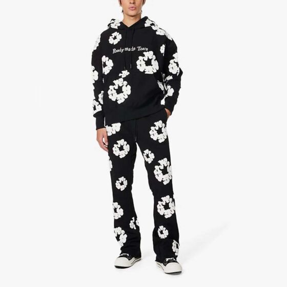 Black READYMADE x DENIM TEARS sweatpants featuring a relaxed fit and logo detailing from central brand.