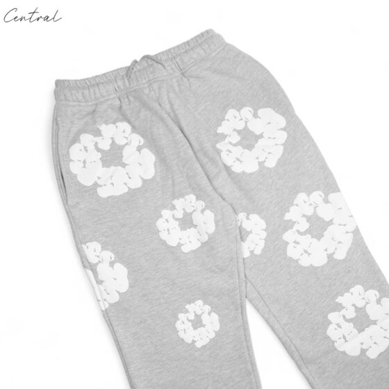 Gray READYMADE x DENIM TEARS sweatpants featuring a relaxed fit and soft fabric, displayed on a neutral background.