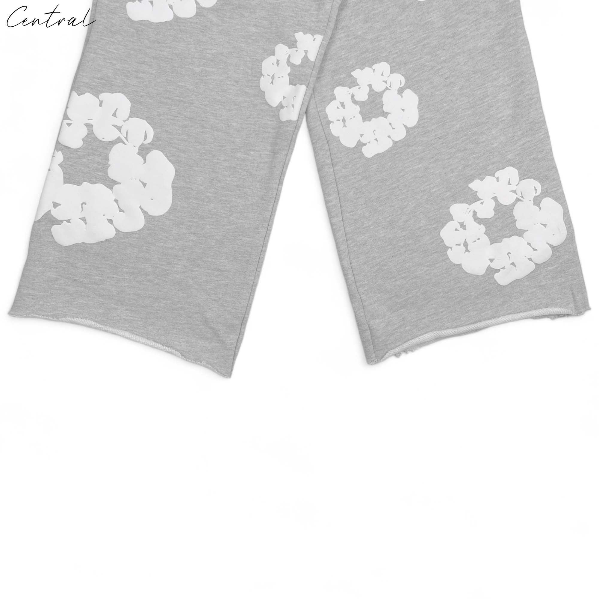 Gray READYMADE x DENIM TEARS sweatpants featuring a relaxed fit and stylish design, displayed on a neutral background.