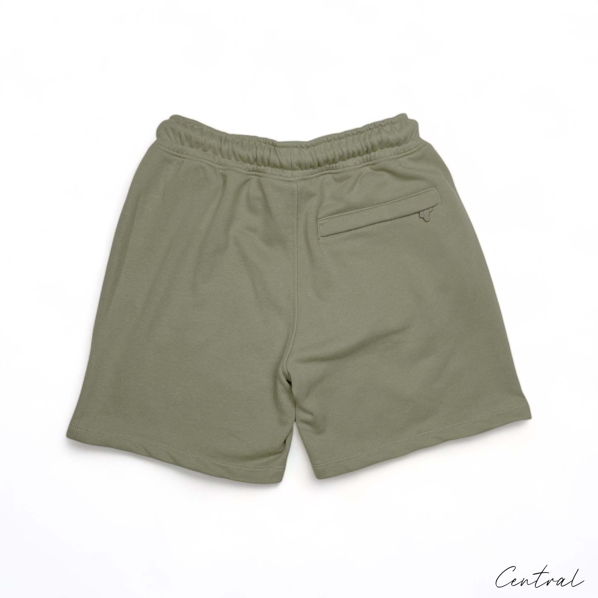 Green Syna World short set featuring a t-shirt and shorts by Central, displayed on a neutral background.