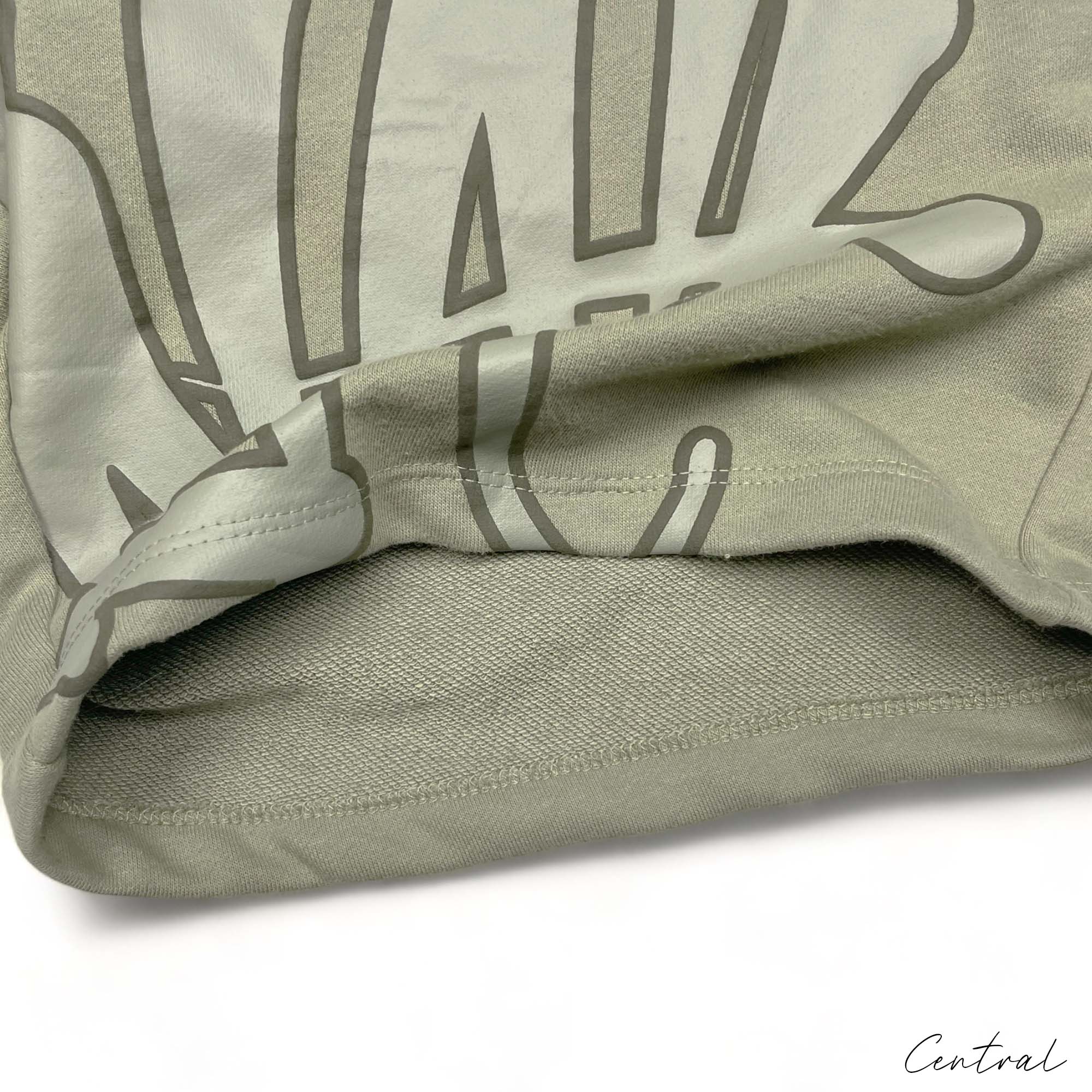 Central Syna World short set in green featuring a matching t-shirt and shorts, displayed on a neutral background.